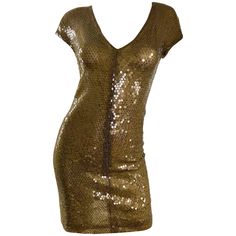 Sexy vintage early 1990s KRIZIA hunter green silk sequined semi sheer mini dress! Features thousands of hand-sewn deep green sequins on double layered silk net. Simply slips over the head, and stretches to fit. Can easily be dressed up or down, and perfect all year round. Great belted or alone, and with wedges, sandals or flats for day, and heels or boots for day. Would also look fantastic with a blazer or denim jacket! In great unworn condition. Made in Italy Approximately Size Medium (tons of Vintage Green Dress, Forest Green Dresses, Short Green Dress, Green Cocktail Dress, Sheer Mini Dress, Cocktail Dress Vintage, Mini Robes, Sequin Cocktail Dress, Dresses Cocktail