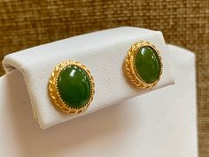 Welcome To Gold Knox Beautiful vintage 12K yellow gold filled and green cabochon jade stud earring set Great gift for any occasion. Details below: Materials 12K yellow gold, jade Hallmark 12K G.F. This would make great addition to your vintage collection. Thank you for looking Gold Knox opened its storefront in Pasadena, CA in 2011, since then we have an online store on eBay, and we joined Etsy in 2016 where we offer our unique and desirable items for you. Most all our items are vintage they are Yellow Gold Jade Jewelry With Cabochon, Vintage Yellow Gold Cabochons As Gift, Vintage Yellow Gold Cabochons For Gift, Elegant Green Cabochons For Gifts, Elegant Green Cabochons As Gifts, Vintage Jade Round Earrings, Classic Gold Cabochons For Gifts, Classic Jade Jewelry With Matching Earrings, Jade Cabochon Earrings As A Gift