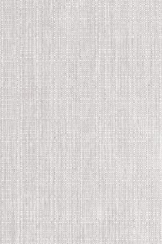 white fabric textured with small dots on the outside, as if it were woven into a wallpaper