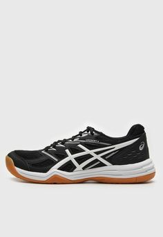 the black and white asics running shoe is shown with an orange sole on top