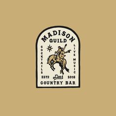 the logo for madison guid country bar on a tan background with black and white lettering