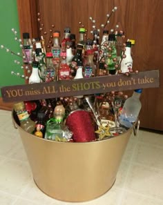 a metal bucket filled with lots of bottles