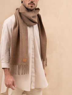 Our 100% natural fibre scarf is a must-have accessory for any fashion-forward individual. Made from the finest llama and sheep wool, this scarf combines the best in comfort, texture and style. The scarf is available in 16 stunning colors that complement outfits all year round, whether the weather’s cooling, or you’re in the middle of winter - our 100% natural fibre scarf is the perfect accessory. The fringe detailing adds a touch of sophistication to the look, making it the perfect accessory for Scarf Outfit, Mens Beanie, Natural Fibre, Fleetwood Mac, Sheep Wool, Winter Scarf, Natural Fibers, Llama, Winter Coat