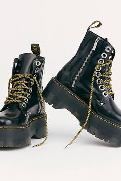 **Fit Note:** If in between whole sizes, we recommend sizing down.A super bold update to Dr. Martens' classic chunky Jadon boot, these towering chunk platform boots feature oversized eyelets and a medial zip with eye-catching striped laces.* Side zipper closure* Full-grain smooth leather with glossy finish* Goodyear Welt design, upper and sole are sewn together