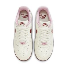 In celebration of Cupid's season, Nike reveals its all-new Air Force 1 “Valentine’s Day. The Nike Wmns Air Force Valentine's heart shaped cherries hanging over the Swoosh and heart cutouts fitted on the heel tabs. The Swoosh logo is featured in deep red with pink outline embroidery. Additional heart motifs dot the "Air" lettering on the midsoles. FD4616-161 New Air Force 1, Yeezy Boots, Nike Models, Jordan 11 Retro Low, Womens Air Jordans, Dunks Nike, Jordan 11 Retro, Nike Air Force 1 Low, Air Force 1 Low