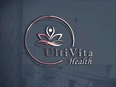 the logo for uttiva health is shown in pink and gray colors on a dark background