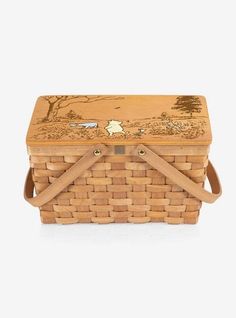 a wooden basket with handles on it