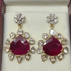 Product code: 280000 weight: 12.300 grams gemstone name: ruby gemstone weight: 18 cts (heart) diamond weight: 2.00 cts (uncut rosecut) + 1.01 ct (excellent deluxe rbc) closure: screwback dimensions: 38 mm x 25 mm ps: 3 small links at bottom of each earring is optional for hanging beads or any additional customisation. if not needed, please add in personalisation message and we will remove them. Hanging Beads, Heart Diamond, Ruby Gemstone, Rose Cut Diamond, Diamond Heart, Beauty Book, Favorite Jewelry, Jewelry Earrings Dangle, Diamond Earrings