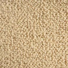 an up close shot of the texture of a carpet with white and beige colors on it