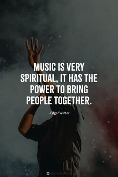 a man with his hands up in the air, saying music is very spiritual it has the power to bring people together