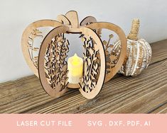 laser cut pumpkin candle holder on wooden table