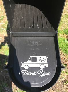 a mailbox with the words thank you written on it and an image of a truck