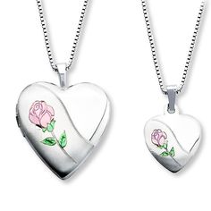 This mother and daughter necklace set features a heart-shaped locket and pendant decorated with a diamond-cut rose colored in pink and green enamel. The set is crafted of sterling silver and comes with a 14- and 18-inch box chain so mother and daughter have the perfect fit. Each necklace is secured with a spring ring clasp. Wedding Gift For Daughter, Mother Daughter Necklaces, Daughter Necklaces, Heart With Rose, Necklaces Heart, Mother Daughter Bracelets, Keepsake Wedding, Diamond Initial Necklace, Mother Daughter Necklace