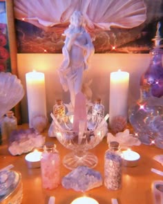 Aphrodite goddess surrounded by lit candles and Rose quartz Crystal Room, Witches Altar, Crystal Aesthetic, Season Of The Witch, Witch Aesthetic, Sacred Space