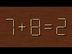 the letters e and f are made out of matchsticks on a wooden surface