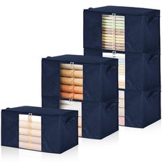 four storage bins with different colored sheets in them