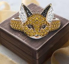 Introducing our enchanting Fox Face Ring, a perfect blend of whimsy and elegance that will captivate any animal lover's heart. This adorable Silver Origami Fox Ring captures the spirit of a playful fox in a sleek, modern design. Handcrafted from high-quality sterling silver, this unique hip hop ring is not only a stylish accessory but also a meaningful piece of art. Whether you're treating yourself or looking for the perfect gift for an animal lover, this silver fox ring is sure to impress. Our Ring Origami, Silver Cat Ring, Fox Ring, Skull Wedding Ring, Mens Skull Rings, Fantasy Ring, Hip Hop Rings, Face Ring, Fox Face