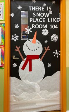 a classroom door decorated with a snowman and saying there is snow place like room 104