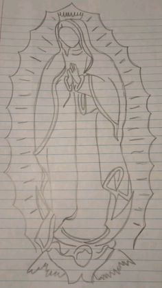 a drawing of the virgin mary on lined paper