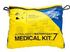 the medical kit is yellow and blue with black zippers on it's side