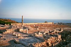 the ruins of an ancient city near the ocean