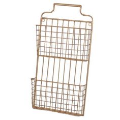 a gold metal rack with two baskets on it