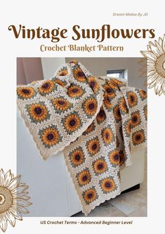 a crocheted blanket with sunflowers on it