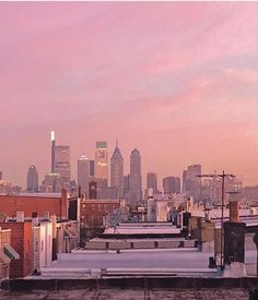 the city skyline as seen from an old rooftop