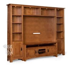 a wooden entertainment center with shelves and drawers