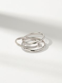 Add some movement and shine to your look with this Sterling Silver layered ring. Our Layered Movement Ring is three rings in one, all connected to give you the easiest layered look ever. While two of the Sterling Silver rings are simple bands, the third is a pavé design to give you some extra shine. For a full look, pair this pre-stacked ring with our silver and Sterling Silver jewelry. Brightening Skincare, Uncommon James, Layered Rings, Simple Band, Three Rings, Full Look, Layered Jewelry, Engraved Jewelry, Beauty Items