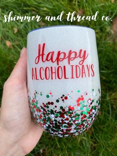 someone is holding up a wine glass with the words happy alcohol days painted on it