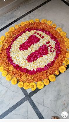 an image of a flower arrangement on the floor for diwaling or decorating