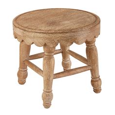 a wooden stool with turned legs on an isolated white background