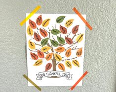 a card with a tree made out of different colored leaves and words that read, your thanksgiving tree