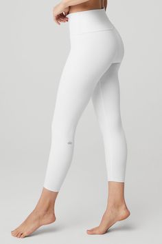 The 7/8 High-Waist Airbrush Legging — all the smoothing, sculpting benefits of the full-length version, in a perfectly cropped package. So good for studio & all-day cool for street, this look features flat-locked seaming for comfort and functionality, no side seams, and an on-trend high waist. Sculpts, lifts & smooths! No side seams & flat-locked seams for extra comfort Designed & uniquely fit to flatter every size Wear-tested by our in-house team for the perfect fit Alo Yoga® | 7/8 High-Waist A White High Waist Leggings, White Wool Leggings, Nike White Leggings, White Workout Set, Awesome Leggings, Womens Onesie, Gym Pants, Healthy And Happy, Tank Top Bras