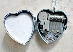 Music box locket heart shaped locket with by Charsfavoritethings Music Box Necklace, Music Box Locket, Dragons Breath Opal, Heart Shaped Locket, Saint Helens, Box Necklace, Music Box Jewelry, Silver Dragon, Silver Lockets