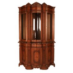 an old fashioned wooden grandfather clock with carved carvings on the front and sides, set against a white background