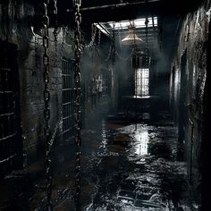 a dark hallway with chains hanging from the ceiling