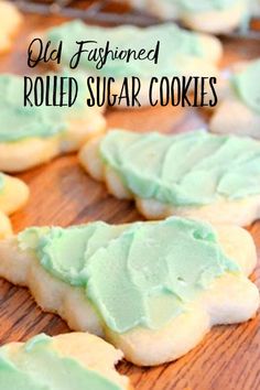 old fashioned rolled sugar cookies with green frosting on a wooden surface and text overlay that reads old fashioned rolled sugar cookies