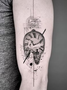 a person with a clock tattoo on their arm