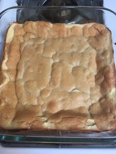 a square cake sitting on top of a stove