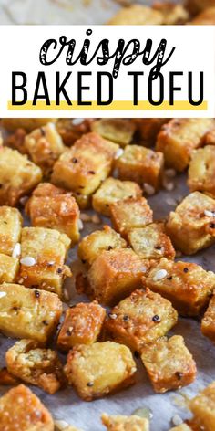 crispy baked tofu on a baking sheet with text overlay that reads, crispy baked tofu