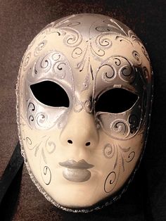 Step into a world of timeless elegance with the exquisite handmade Venetian mask from the renowned atelier, Maschera Del Galeone, rooted in the rich cultural tapestry of 13th-century Italy. This masterpiece isn't just a mask; it's a living piece of history, crafted with passion and precision by skilled artisans who have mastered the art of Venetian mask-making over generations. What makes this mask truly exceptional is its rarity--there is only one like it in the world. As though plucked from th Elegant Masks For Masquerade Festivals, Elegant Masks For Masquerade And Festivals, Elegant Masks For Carnival And Festivals, Elegant Baroque Masquerade Mask For Formal Occasions, Elegant Masks For Theater And Festivals, Elegant White Masks And Prosthetics For Theater, Venetian Full Face Masquerade Mask For Theater, White Venetian Masks And Prosthetics For Festivals, Traditional White Masks For Masquerade