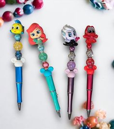 four littlest pet shop pens are lined up next to each other