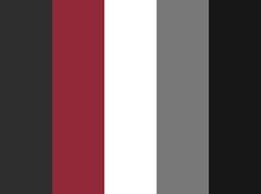 a black and white striped wallpaper with red, gray, and grey stripes on it