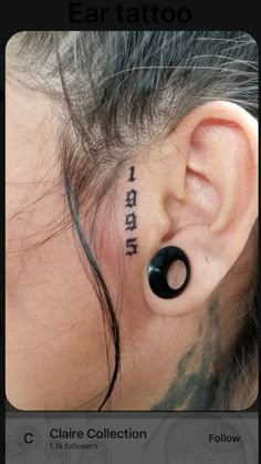 an ear tattoo with the word'i love you'in black ink on it