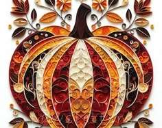 an intricately designed pumpkin with leaves and flowers on it's side, is featured in this paper art project