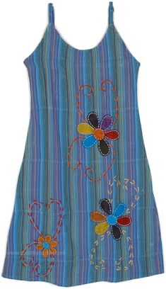 A true statement piece, this cotton dress has the right notes for the perfect fashion statement. With its cool-toned blue striped look, the dress has a soothing effect, and the smocked back with adjustable straps makes the fit just right. #tlb #Embroidered #Applique #Floral #Striped #bohemianfashion #Floraldress #Summerdress #kneelengthdress #cottondress Striped Cotton Sundress For The Beach, Striped Cotton Beach Dress, Cotton Short Sleeve Sundress, Bohemian Striped Sleeveless Dress, Bohemian Sleeveless Striped Dress, Blue Cotton Short Sleeve Sundress, Blue Cotton Sundress With Short Sleeves, Cotton Lined Sundress, Lined Cotton Sundress