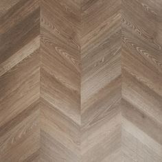 an image of wood flooring that looks like chevrons