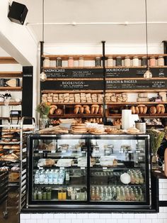 a bakery filled with lots of bread and pastries